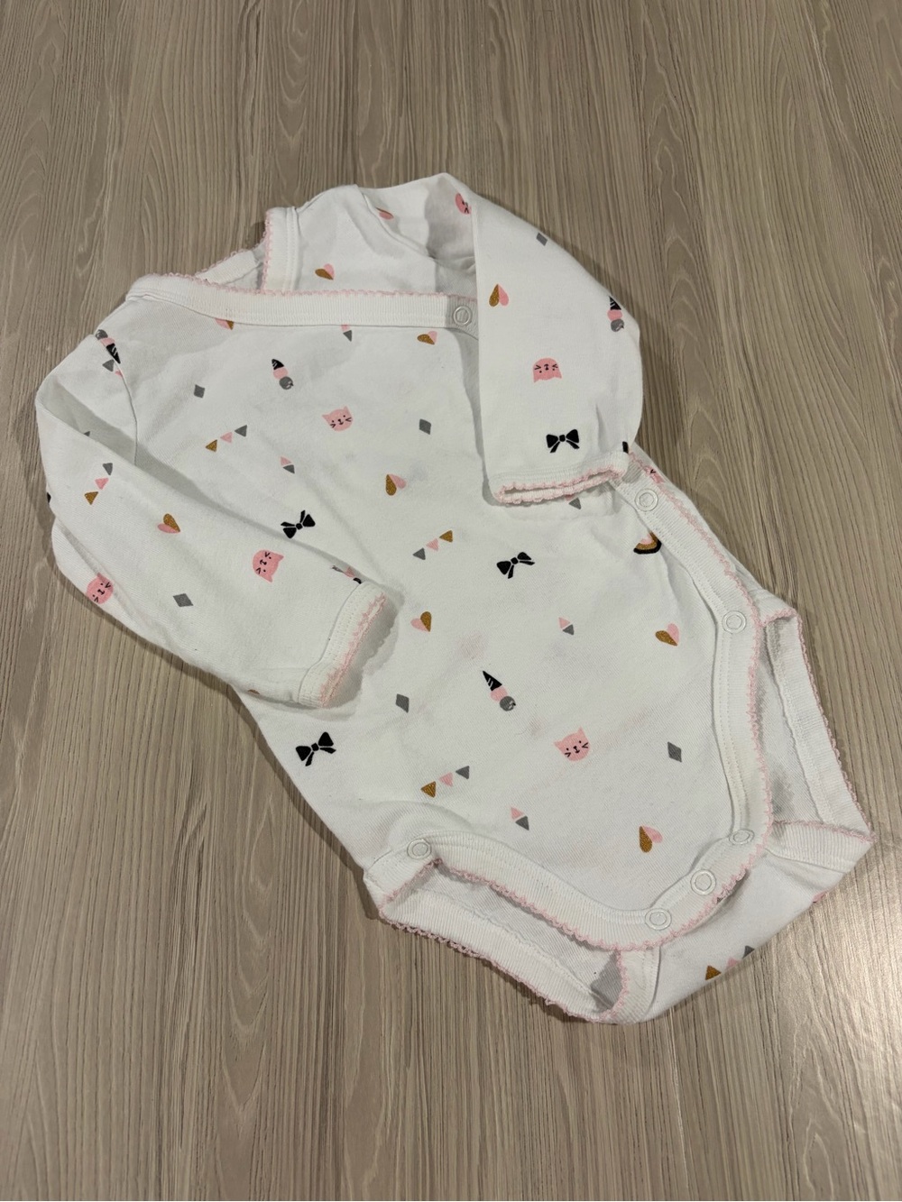 7/$20 Carter’s Baby White Long-Sleeve One-Piece Wrap with Snaps